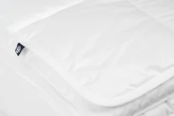 Vuodetekstiilit^Familon peitto Outlast 150x200 cm