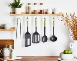 Keittiötarvikkeet^Tefal tarjoilukauha kaavinreunalla Essential 2in1