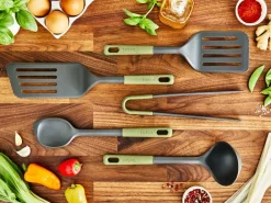 Keittiötarvikkeet^Tefal tarjoilukauha kaavinreunalla Essential 2in1